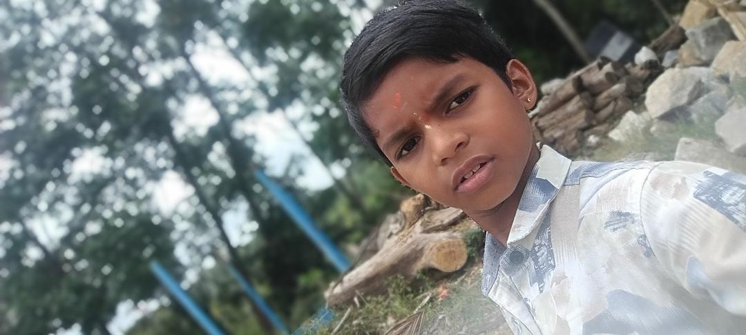 Harsha M